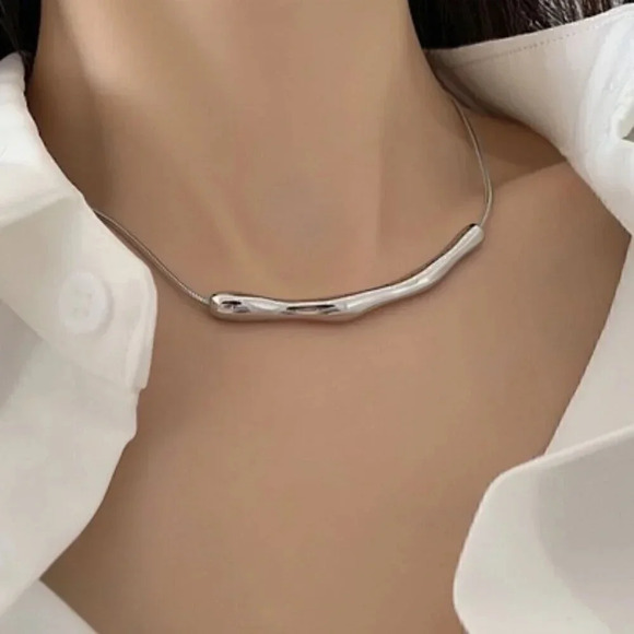 Sterling Silver Necklace: Sleek Silver Necklace with an Abstract Wavy Pendant - Picture 1 of 3
